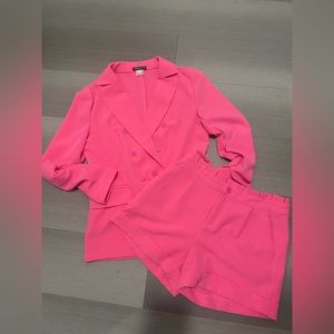 Pink shorts and jacket.